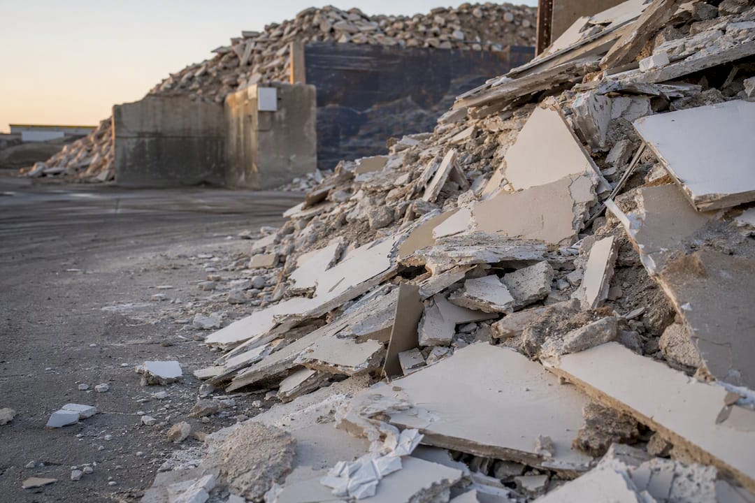 Pile of gypsum plasterboard debris at landfill