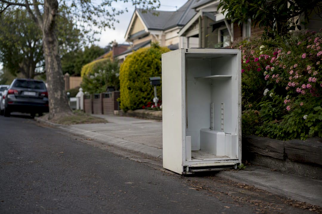 Old fridge at kerbside for council collection