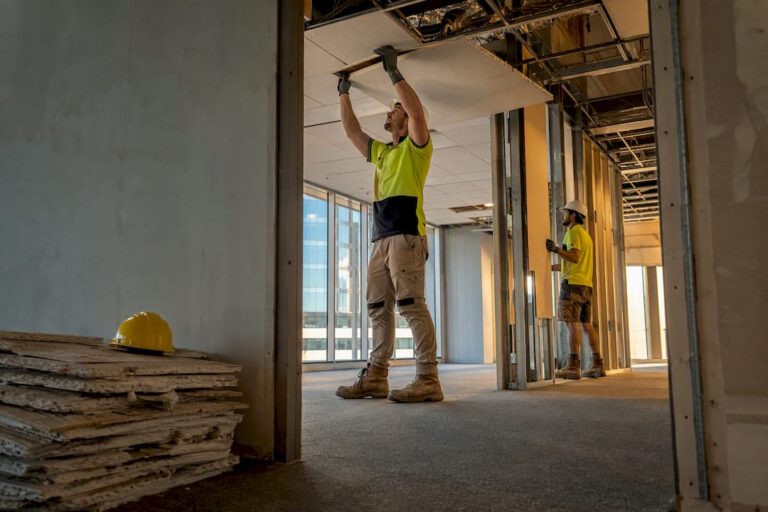 Workers removing non-structural office interiors