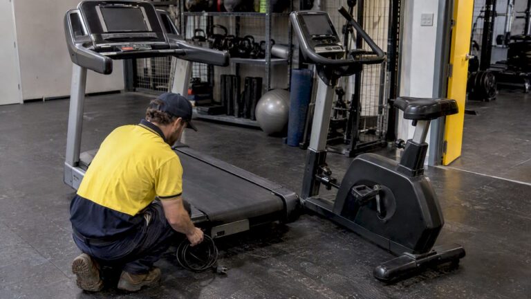 Powered gym equipment staged for removal